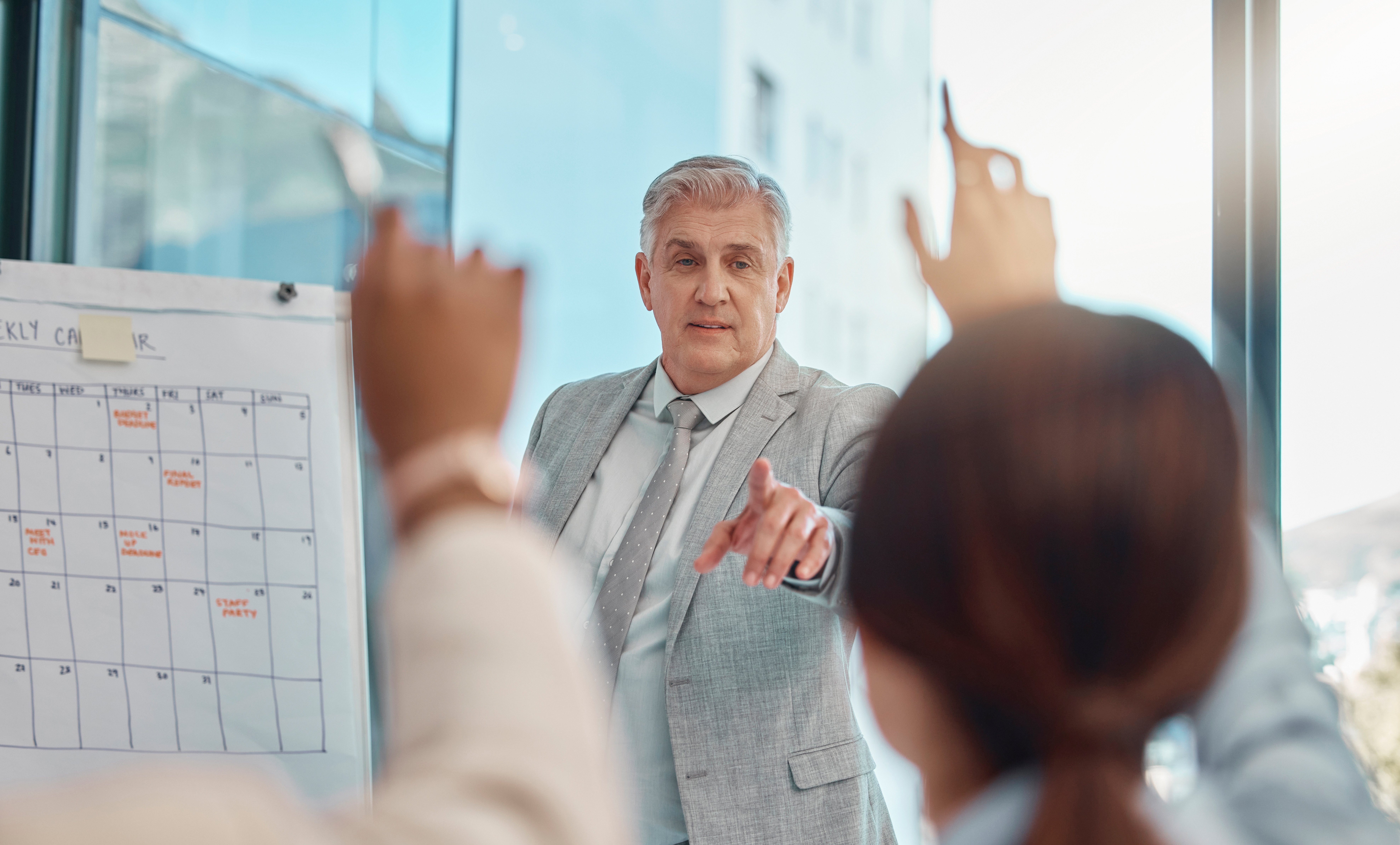 Business man during strategy session answering questions